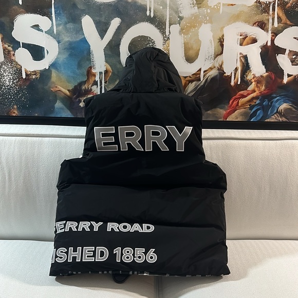 This is a size 14 or a small fit a big kid small man. Reversible Burberry puffer - Picture 3 of 6